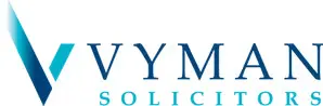 Blue gradient “V” symbol next to the word “Vyman” in blue and “Solicitors” in lighter blue.
